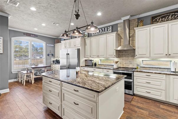 Dining room, Interior, Kitchen, Pendant Lights, Recessed Lighting, Stainless Steel Appliances, Wood Texture Flooring
