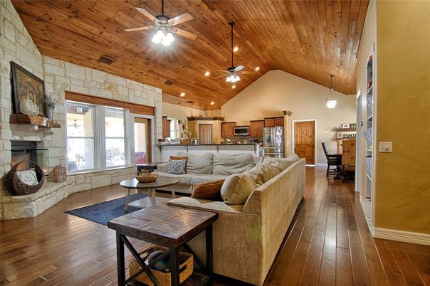 Dining room, Fireplace, Interior, Kitchen, Living room, Pendant Lights, Recessed Lighting, Stone Walls, Wooden Ceilings, Wood Texture Flooring