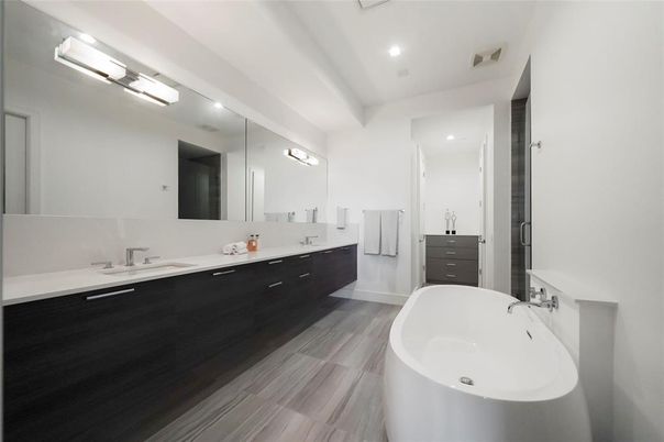 Bathroom, Dual Sink Vanities, Free Standing Baths, Interior, Recessed Lighting, Wood Texture Flooring