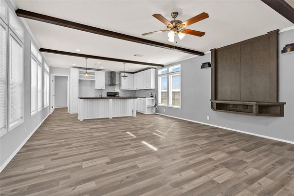 Empty room, Interior, Kitchen, Pendant Lights, Recessed Lighting, Stainless Steel Appliances, Wood Texture Flooring