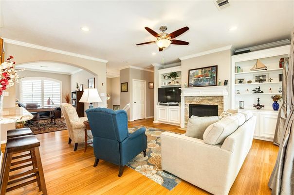 Dining room, Fireplace, Interior, Living room, Recessed Lighting, Wood Texture Flooring