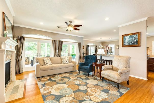 Dining room, Fireplace, Interior, Living room, Pendant Lights, Recessed Lighting, Wood Texture Flooring