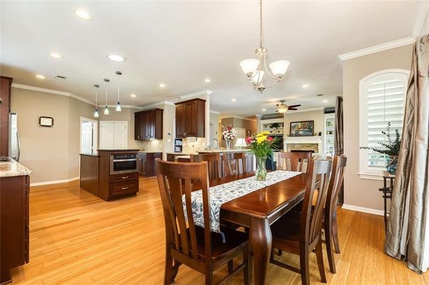 Dining room, Fireplace, Interior, Kitchen, Pendant Lights, Recessed Lighting, Wood Texture Flooring