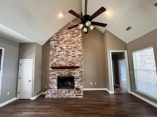 Empty room, Fireplace, Interior, Recessed Lighting, Stone Walls, Wood Texture Flooring