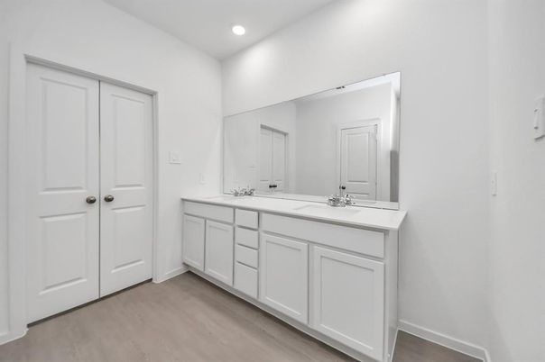 Bathroom, Dual Sink Vanities, Interior, Recessed Lighting, Wood Texture Flooring