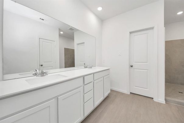 Bathroom, Dual Sink Vanities, Interior, Recessed Lighting, Wood Texture Flooring