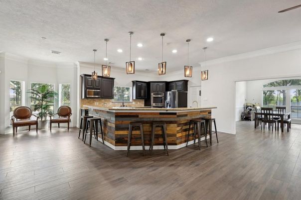 Dining room, Interior, Kitchen, Pendant Lights, Recessed Lighting, Stainless Steel Appliances, Wood Texture Flooring