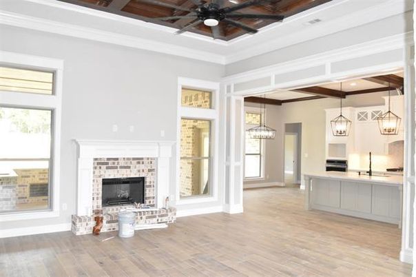 Chandelier, Empty room, Fireplace, Interior, Kitchen, Pendant Lights, Recessed Lighting, Stainless Steel Appliances, Wooden Beams, Wooden Ceilings, Wood Texture Flooring