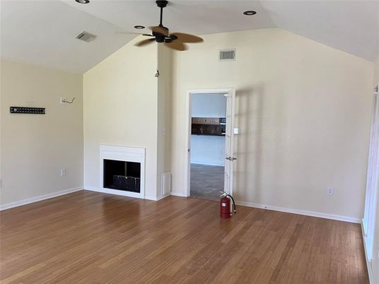 Empty room, Fireplace, Interior, Recessed Lighting, Wood Texture Flooring