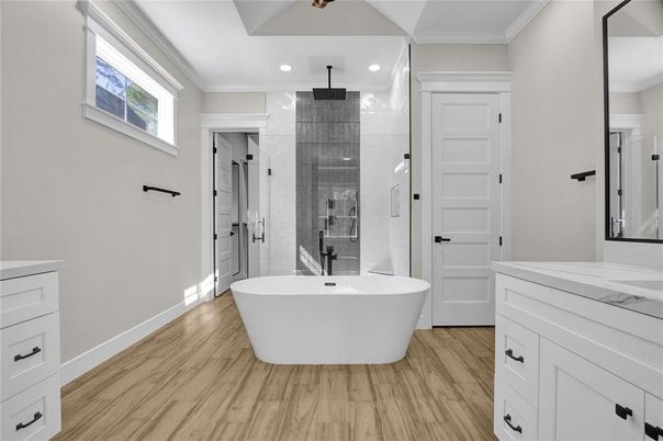 Bathroom, Free Standing Baths, Glass Shower, Interior, Recessed Lighting, Wood Texture Flooring