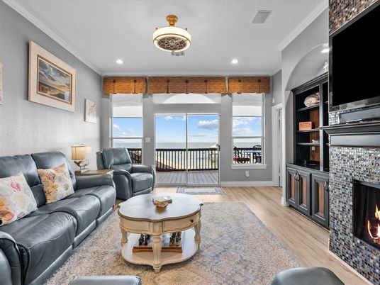 Fireplace, Interior, Living room, Recessed Lighting, Water, Wood Texture Flooring