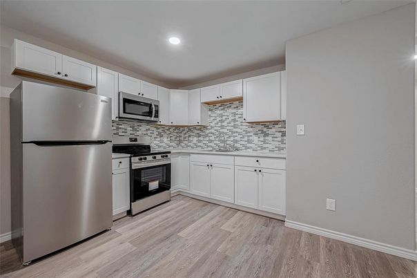 Interior, Kitchen, Recessed Lighting, Stainless Steel Appliances, Wood Texture Flooring