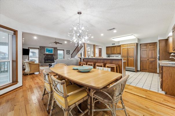 Dining room, Fireplace, Interior, Kitchen, Living room, Pendant Lights, Wood Texture Flooring