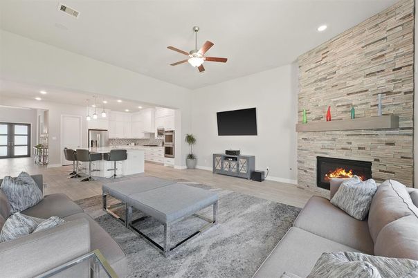 Dining room, Fireplace, Interior, Kitchen, Living room, Pendant Lights, Recessed Lighting, Stainless Steel Appliances, Stone Walls, Wood Texture Flooring