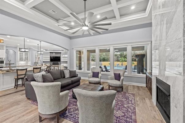 Fireplace, Interior, Kitchen, Living room, Pendant Lights, Recessed Lighting, Stainless Steel Appliances, Wood Texture Flooring
