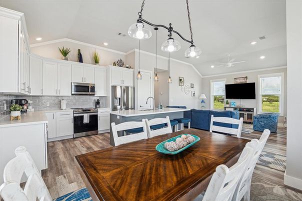 Dining room, Interior, Kitchen, Living room, Pendant Lights, Recessed Lighting, Stainless Steel Appliances, Wood Texture Flooring