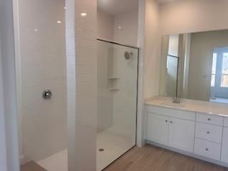 Bathroom, Glass Shower, Interior, Recessed Lighting, Wood Texture Flooring