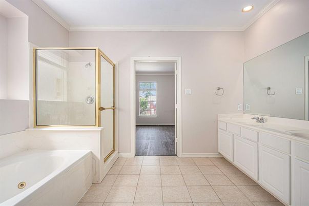 Bathroom, Dual Sink Vanities, Glass Shower, Interior, Recessed Lighting, Wood Texture Flooring