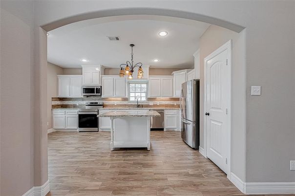 Chandelier, Interior, Kitchen, Pendant Lights, Recessed Lighting, Stainless Steel Appliances, Wood Texture Flooring