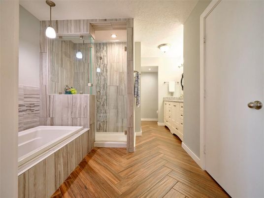 Bathroom, Glass Shower, Interior, Pendant Lights, Recessed Lighting, Wood Texture Flooring
