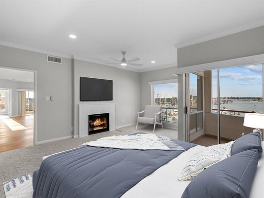Bedroom, Fireplace, Interior, Recessed Lighting, Water, Wood Texture Flooring