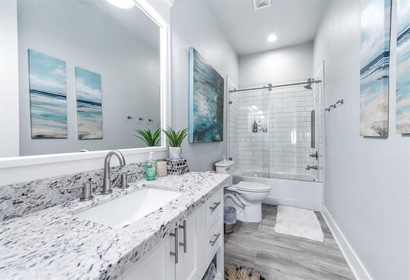 Bathroom, Dual Sink Vanities, Glass Shower, Interior, Recessed Lighting, Wood Texture Flooring