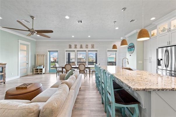 Dining room, Interior, Kitchen, Living room, Pendant Lights, Recessed Lighting, Stainless Steel Appliances, Wood Texture Flooring