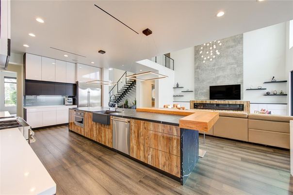 Fireplace, Interior, Kitchen, Living room, Pendant Lights, Recessed Lighting, Stainless Steel Appliances, Wood Texture Flooring