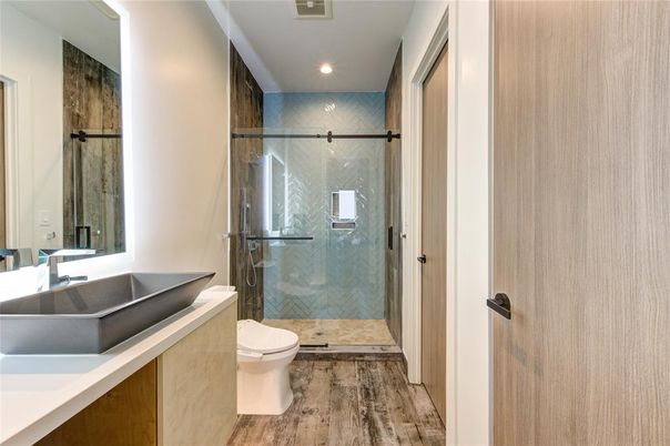 Bathroom, Glass Shower, Interior, Recessed Lighting, Wood Texture Flooring
