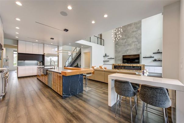 Fireplace, Interior, Kitchen, Living room, Pendant Lights, Recessed Lighting, Stainless Steel Appliances, Wood Texture Flooring