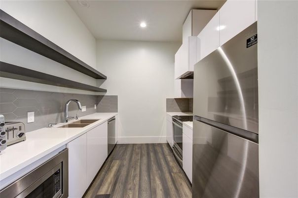 Interior, Kitchen, Recessed Lighting, Stainless Steel Appliances, Wood Texture Flooring