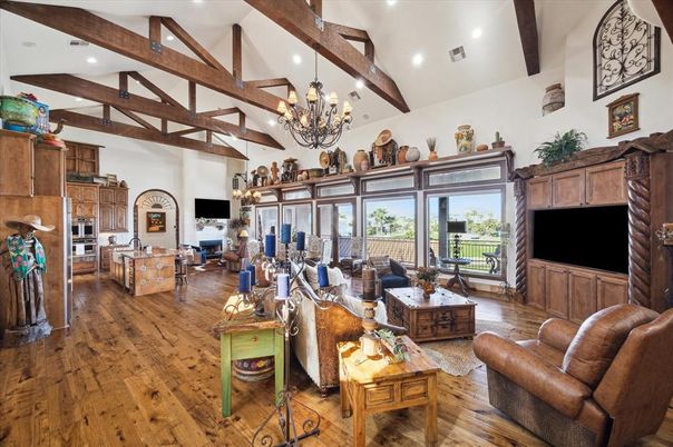 Chandelier, Interior, Kitchen, Living room, Recessed Lighting, Stainless Steel Appliances, Wooden Beams, Wood Texture Flooring