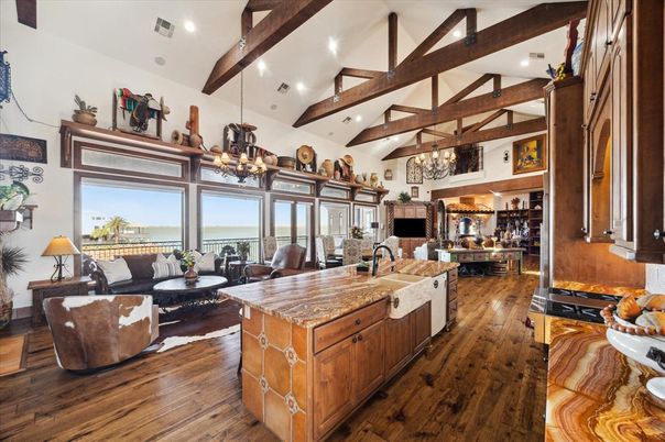Chandelier, Dining room, Fireplace, Interior, Kitchen, Living room, Recessed Lighting, Wooden Beams, Wood Texture Flooring