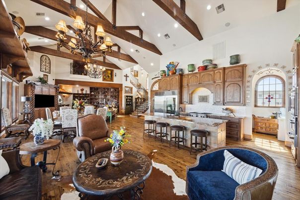 Chandelier, Dining room, Interior, Kitchen, Living room, Recessed Lighting, Stainless Steel Appliances, Wooden Beams, Wood Texture Flooring