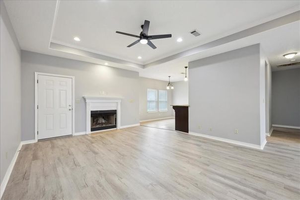 Empty room, Fireplace, Interior, Pendant Lights, Recessed Lighting, Wood Texture Flooring