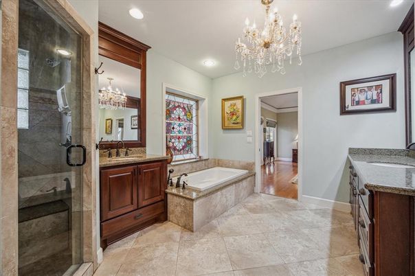 Bathroom, Chandelier, Glass Shower, Interior, Recessed Lighting, Wood Texture Flooring