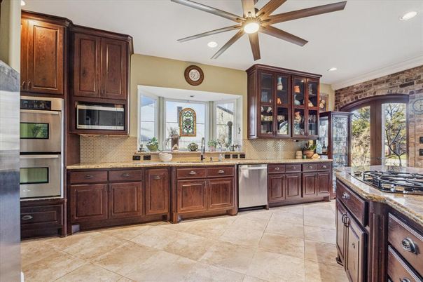 Interior, Kitchen, Recessed Lighting, Stainless Steel Appliances, Stone Walls