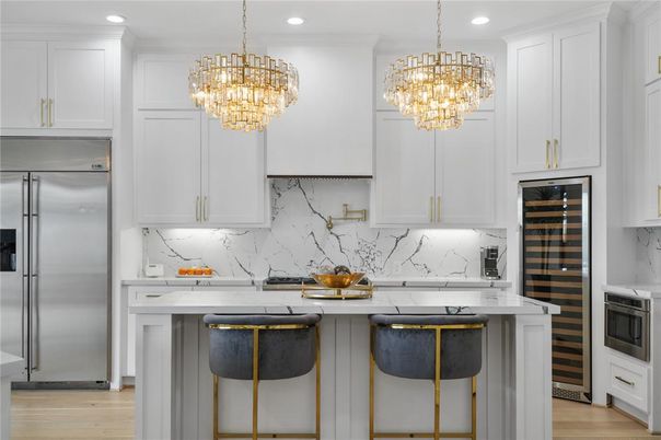 Chandelier, Interior, Kitchen, Marble Walls, Recessed Lighting, Stainless Steel Appliances, Wood Texture Flooring