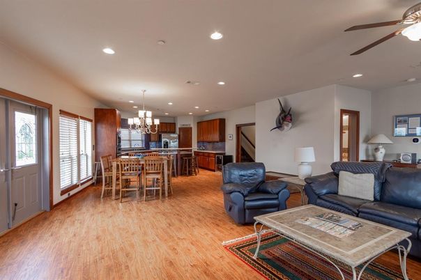 Chandelier, Dining room, Interior, Kitchen, Living room, Pendant Lights, Recessed Lighting, Wood Texture Flooring