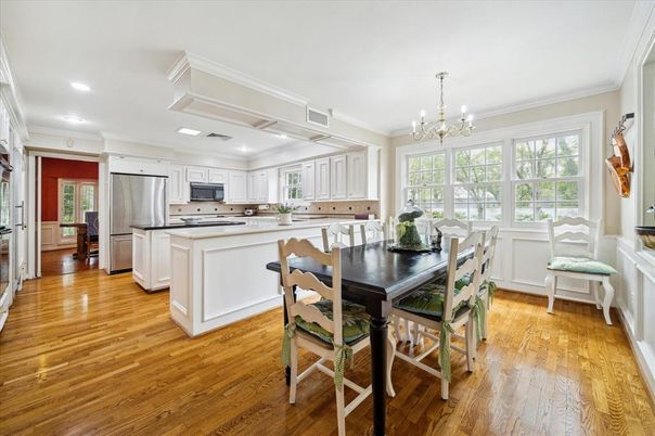 Chandelier, Dining room, Interior, Kitchen, Recessed Lighting, Stainless Steel Appliances, Wood Texture Flooring
