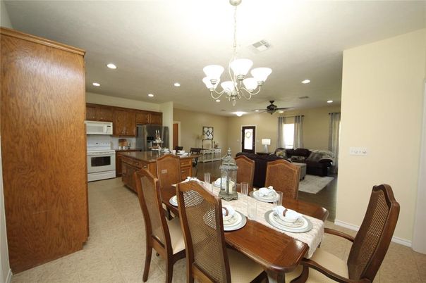 Chandelier, Dining room, Interior, Kitchen, Living room, Recessed Lighting, Stainless Steel Appliances