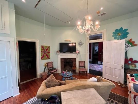 Chandelier, Fireplace, Interior, Living room, Recessed Lighting, Wood Texture Flooring