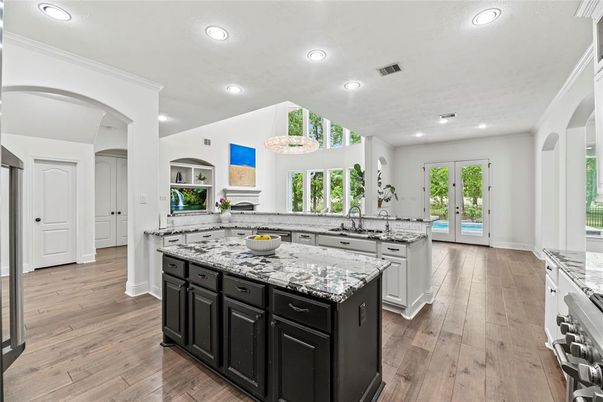 Chandelier, Interior, Kitchen, Recessed Lighting, Stainless Steel Appliances, Wood Texture Flooring