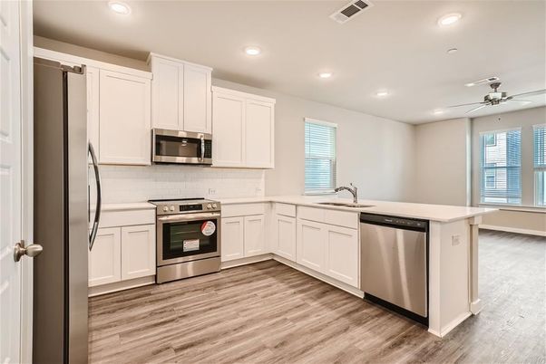 Interior, Kitchen, Recessed Lighting, Stainless Steel Appliances, Wood Texture Flooring