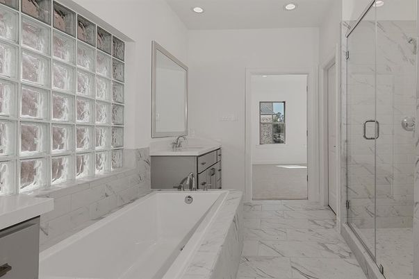 Bathroom, Dual Sink Vanities, Glass Shower, Interior, Marble, Marble Walls, Recessed Lighting