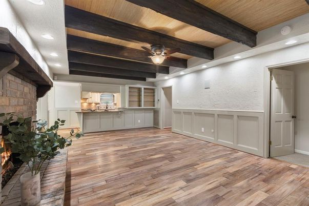 Empty room, Fireplace, Interior, Recessed Lighting, Stone Walls, Wooden Beams, Wooden Ceilings, Wood Texture Flooring