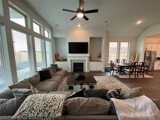 Dining room, Fireplace, Interior, Living room, Recessed Lighting, Wood Texture Flooring