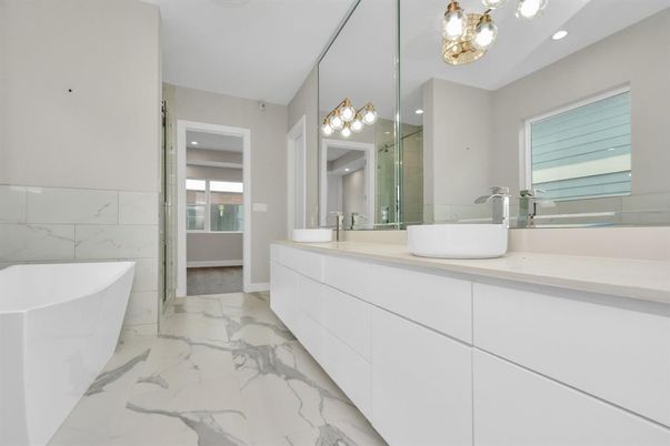 Bathroom, Dual Sink Vanities, Free Standing Baths, Glass Shower, Interior, Marble, Marble Walls, Recessed Lighting