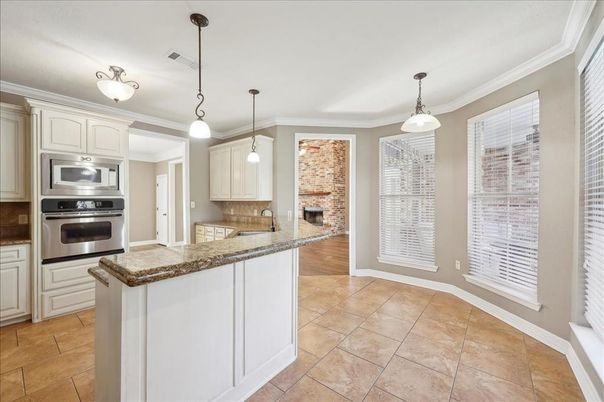 Fireplace, Interior, Kitchen, Pendant Lights, Stainless Steel Appliances