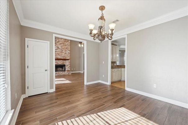 Chandelier, Empty room, Fireplace, Interior, Stone Walls, Wood Texture Flooring